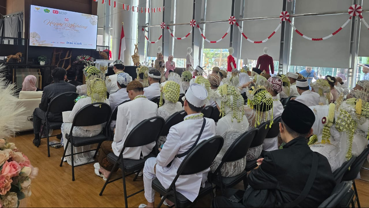 87 pasangan WNI di Taiwan melakukan prosesi nikah massal (foto: Kemenag RI)