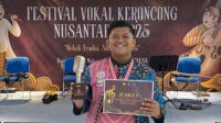 Mahasiswa FEB Unsoed Mardika Nur Wahid meraih Juara Pertama Festival Vocal Keroncong Nusantara 2025. (foto: Humas Unsoed) Mahasiswa FEB Unsoed Mardika Nur Wahid meraih Juara Pertama Festival Vocal Keroncong Nusantara 2025. (foto: Humas Unsoed)